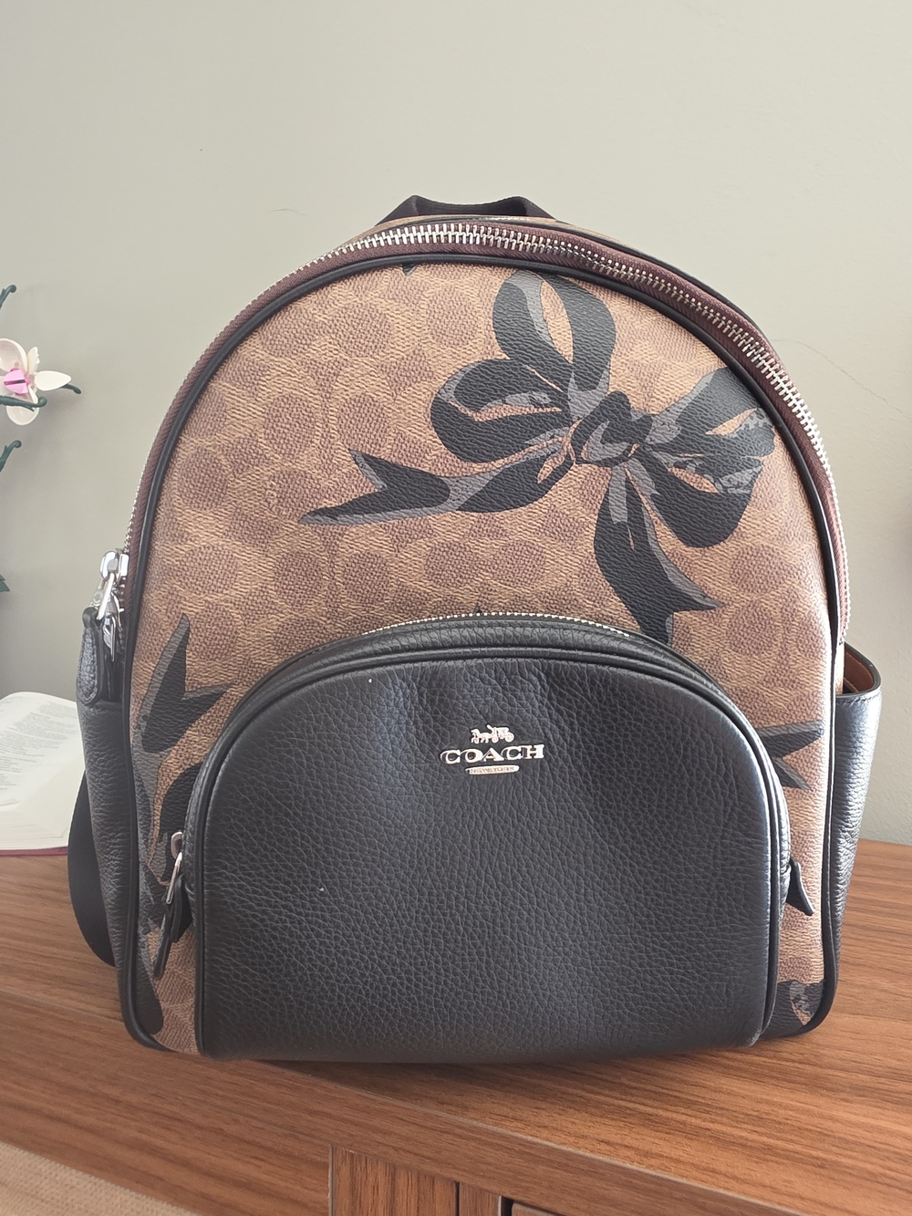COACH Brown and Black Signature Floral Mini Backpack
